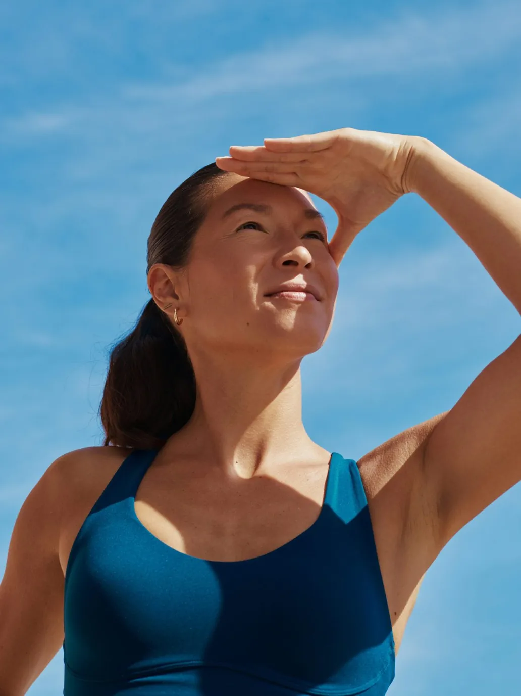 Woman standing calmly in daylight