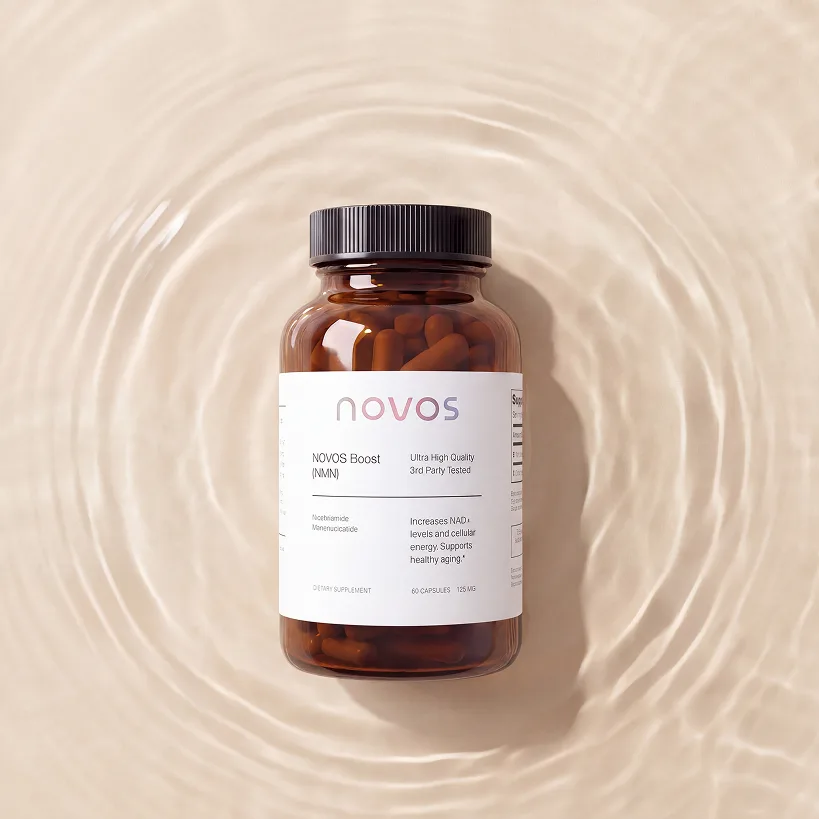 NOVOS Boost bottle standing in rippling water