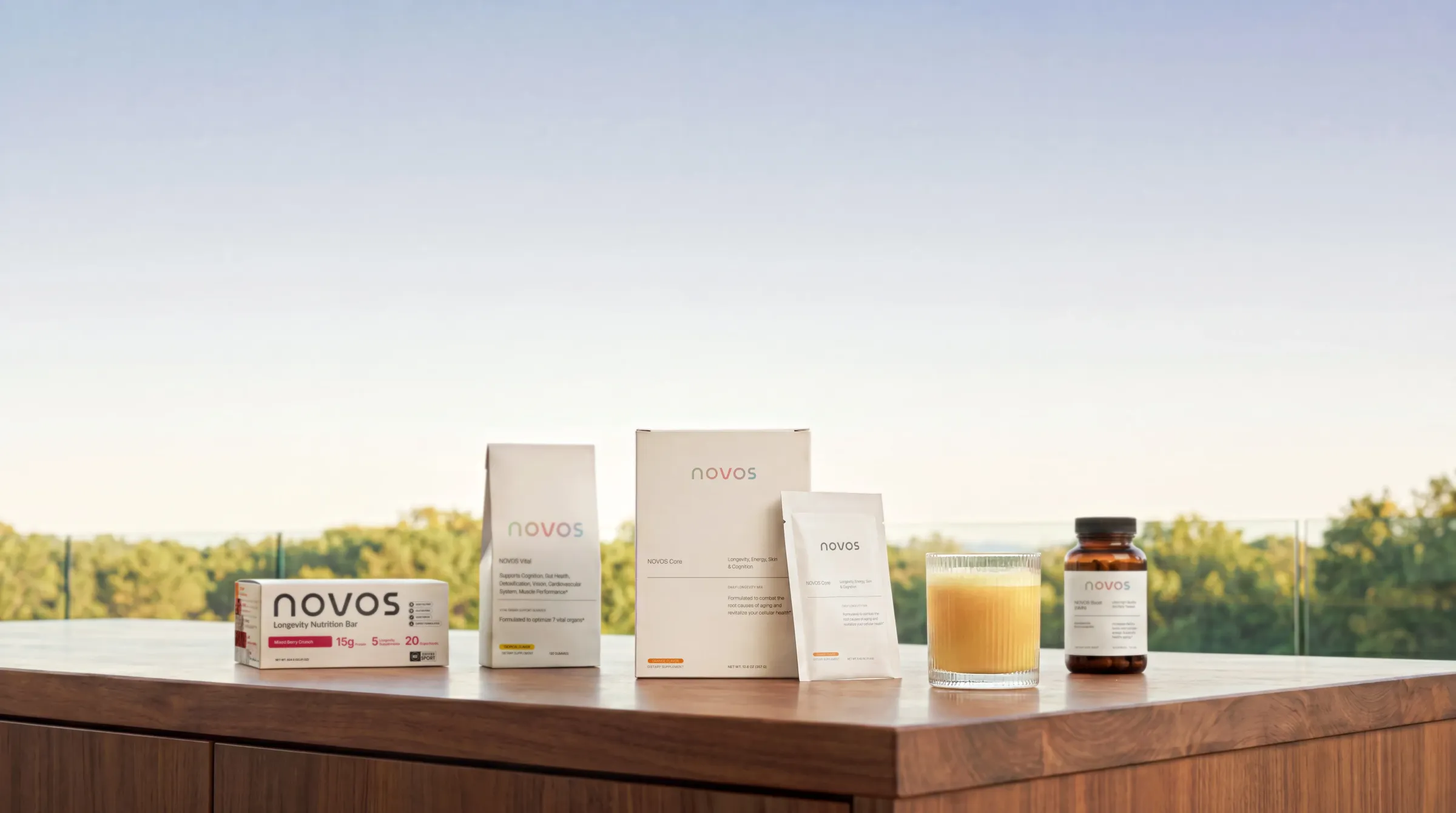 The NOVOS range — Bar, Vital, Core, Boost — on a terrace table
