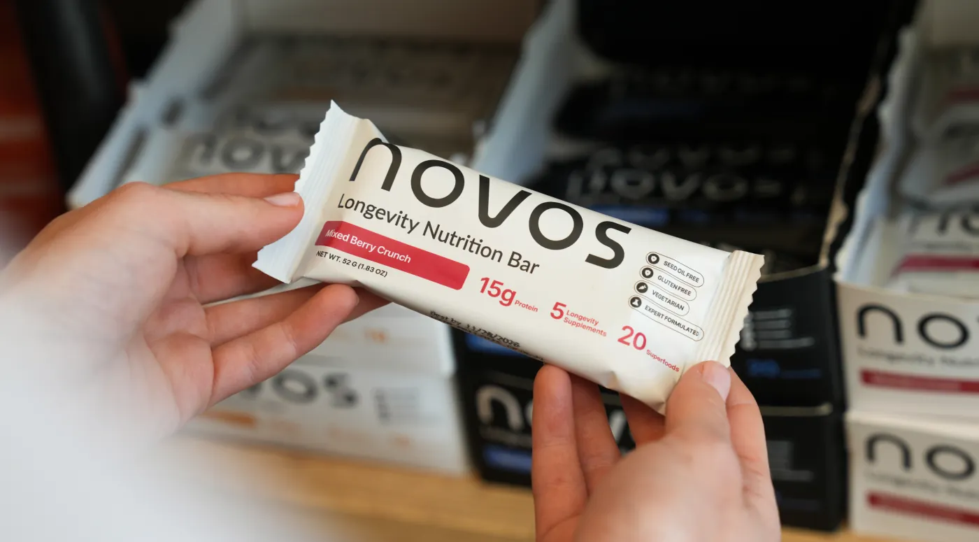 Three NOVOS Longevity Nutrition Bars — Salted Chocolate, Mixed Berry, and Peanut Butter Chocolate Chip